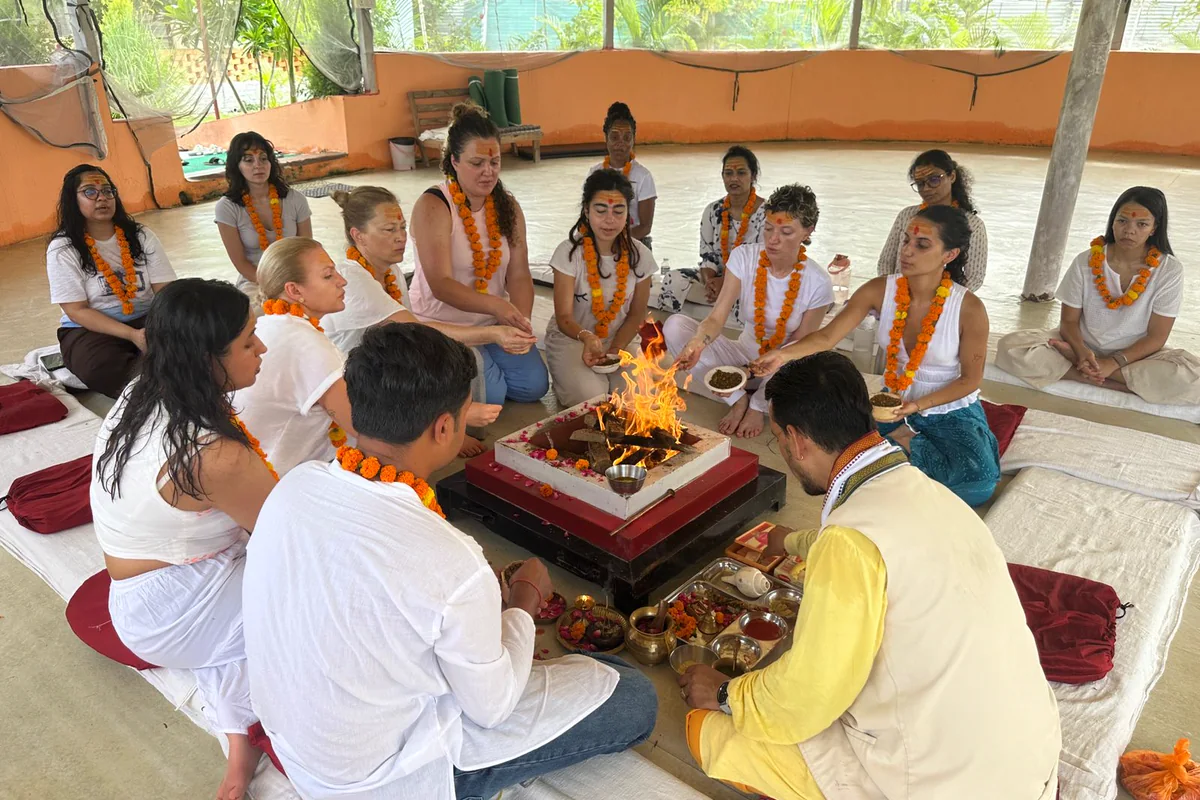 Teachers and students at a havan ceremony